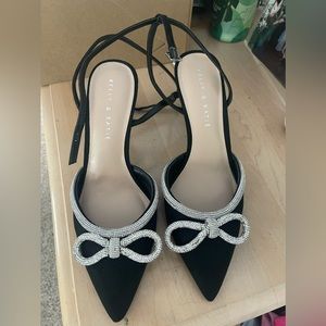 Kelly & Katie Black Pumps with Rhinestone Bow